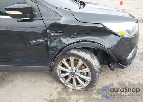 2017 Ford Escape Titanium z USA, uszkodzony, nr VIN 1FMCU9J92HUD86049